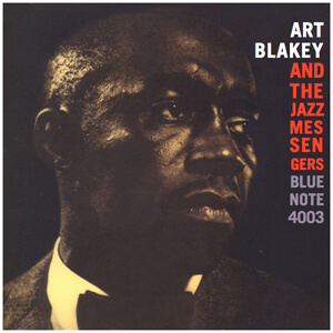 image of art blakey with the title arranged in the shape of a number one running down the right hand side of the sleeve